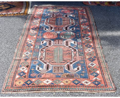 A Tribal rug, having geometric borders, 230 x 134cm.&nbsp; 