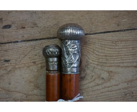 A Chinese silver mounted malacca cane;&nbsp;and another malacca cane. (2) 