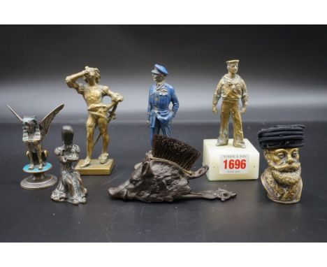 A small group of bronze and other similar figures,&nbsp;to include a silver plated sphinx; a polychrome painted RAF officer; 