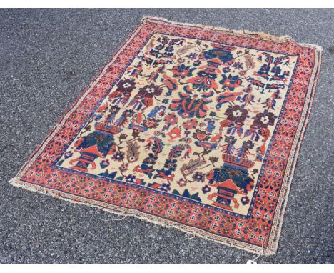 A Persian rug,&nbsp;having floral central field, with floral borders, 136 x 110cm.&nbsp; 
