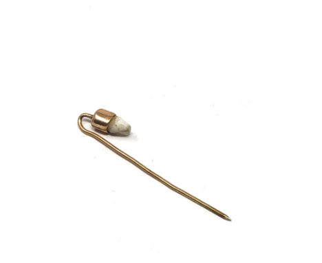 Antique gold tooth set  stick pin measures approx 4.3cm long 