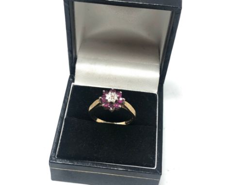 9ct gold ruby and diamond flower ring (2.3g) 