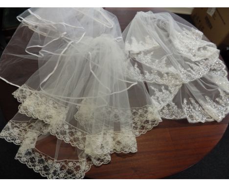4 wedding veils - 2 white with satin edge and 2 ivory with lace and silver sequin detail (all waist length drop aprox)
