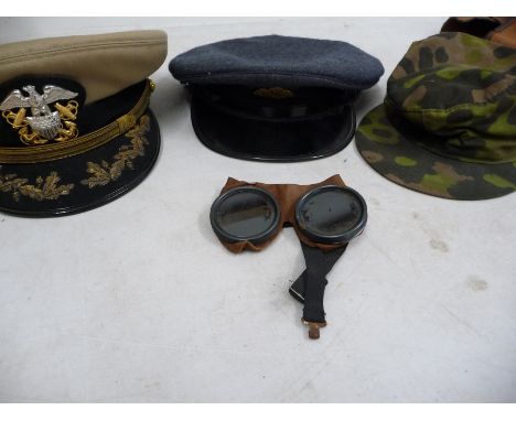 Navy caps, army cap and goggles&nbsp;