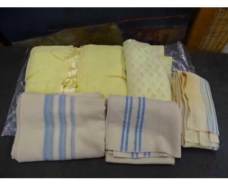 Vintage blankets and pairs of curtains&nbsp;