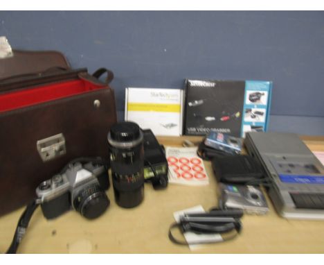 Pentax K1000 camera with Tamron lens, 2 modern camera's and few accessories plus accessories and a tape player&nbsp;