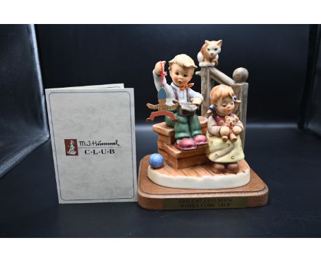 Goebel M J Hummel Collectors club exclusive 2000-2001 large figurine on a wood plinth titled 'Wishes Come True' from the wond