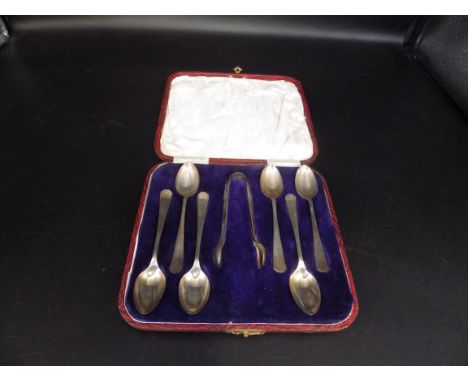 A cased silver hallmarked spoon and sugar tong set, Sheffield 1926 - James Deakin &amp; Sons (John and William Deakin) 70g to