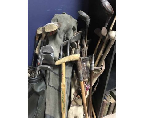 LOT OF VINTAGE HICKORY SHAFTED AND OTHER GOLF CLUBSalong with shooting sticks and a cricket bat