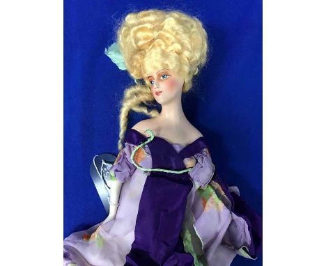 1960S HANDPAINTED CERAMIC DOLLin a silk costume