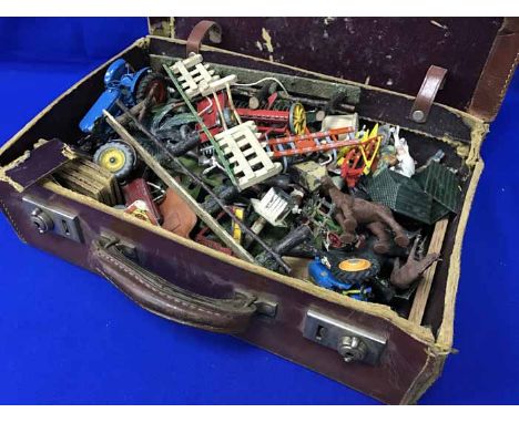VINTAGE CASEtogether with a collection of toys, including Dinky, etc 