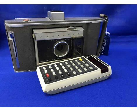 GOOD LOT OF CAMERAS AND TOOLSincluding Zeiss Ikon Tenax camera, Kodak Brownie, Polaroid, pipe cleaner, Rolls Razers, and Volt