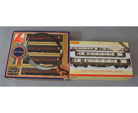 OO Gauge. Hornby R4254 Venice Simplon-Orient Express 4 coach pack together with Lima 4 coach pack. All G/VG boxed.