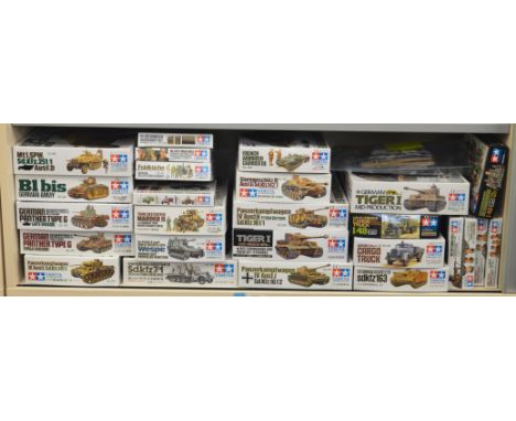 26 Tamiya military model kits, scenery and figures, all boxed. 1/35th scale (contents not checked) Together with 1/35th scale