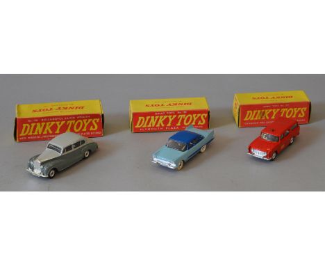 Three Dinky Toys: #150 Rolls-Royce Silver Wraith; #178 Plymouth Plaza in light blue with dark blue roof and side flash, corre