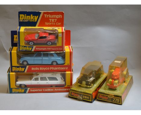 Five boxed Dinky Toys, 279 Diesel Roller and 284 London Taxi, appear VG in F/G vacuform packs with some discolouration (279 b