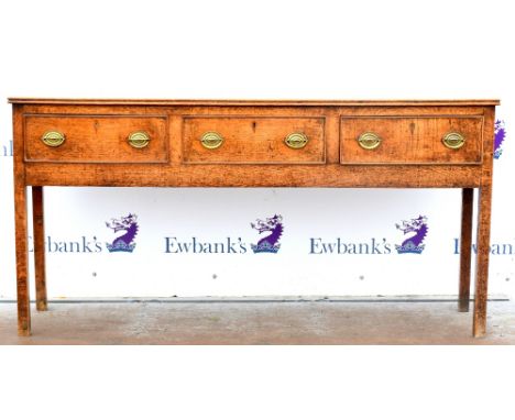 AMENDED DIMENSIONS Early 19th century oak dresser base with three short drawers on square tapering supports. 180W x 36D x 91H