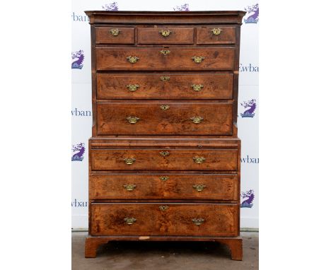 18th century crossbanded walnut tallboy the top part of three short  and three long graduated drawers, the base with a brushi