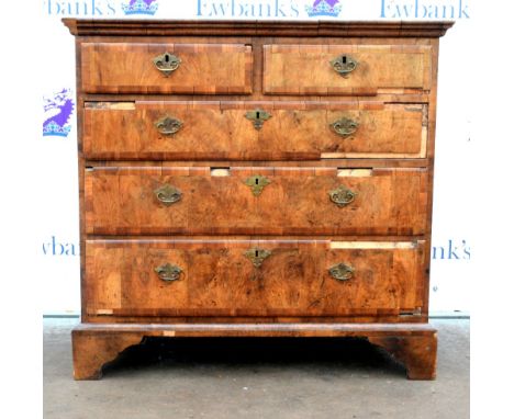 18th century walnut veneered chest of two short crossbanded drawers over three further long graduated drawers on later bracke