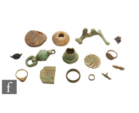 12th to 13th Century - A strap fitting of swivel form, cross and line decoration, recorded under the PAS system WAW-E50A69, l