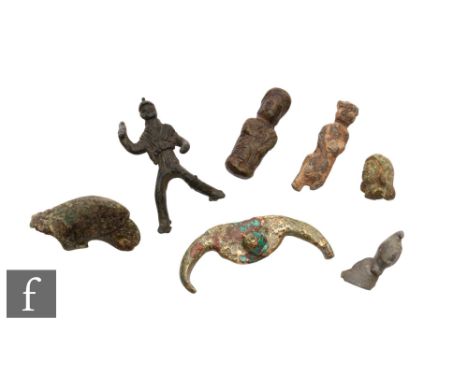 Roman to Medieval - A head of a female with hair in a bun, a figure of a beaded warrior throwing a spear, height 4cm, a small