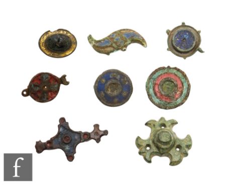 Roman - A collection of eight disc and other brooches retaining some enamel detail including a cabochon stone and gilt set ex