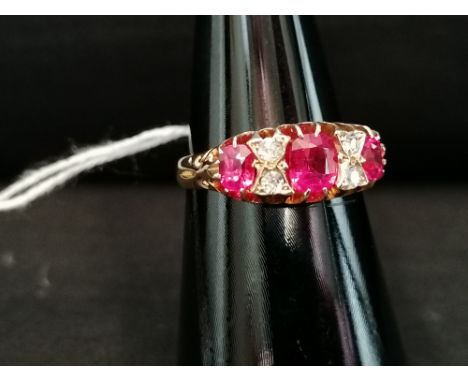 18ct Edwardian seven stone ruby and diamond ring circa 1900.