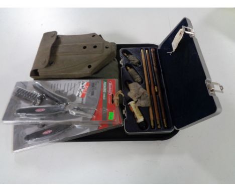 A tray of cased gun cleaning kit, two Berkley fishing tools (new), together with a military shovel in carry pouch 