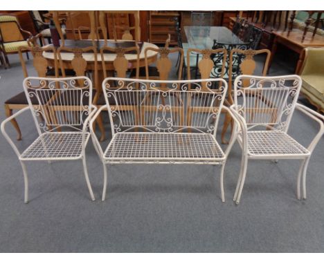 A painted metal two seater garden bench and three matching chairs 