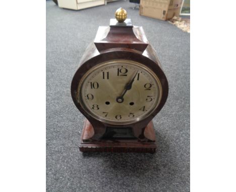 An early twentieth century continental balloon mantle clock with enamel dial (no door)