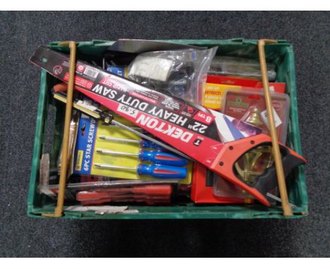 A crate of new tools, screw driver set, hand saw, brass door knocker, trowel etc 