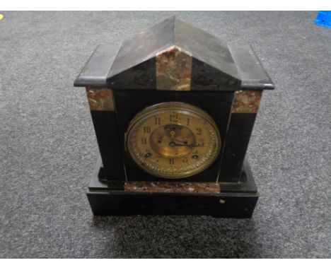 A Victorian black slate mantel clock with brass dial 