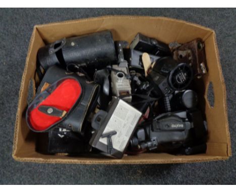 A box of vintage and later cameras, cased binoculars, Sanyo video camera 