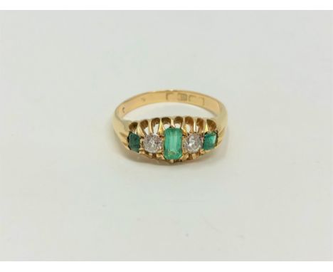 An antique 18ct gold emerald and diamond ring, size M1/2 CONDITION REPORT: 3.3g