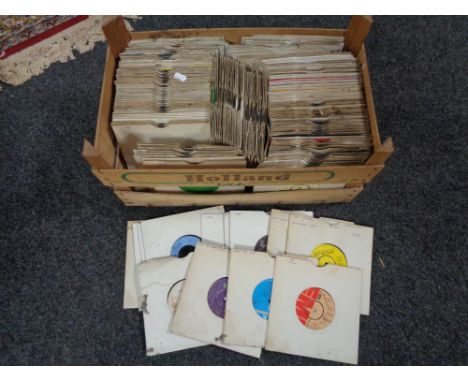 A wooden crate of 45 singles including The Rolling Stones, Buddy Holly etc 