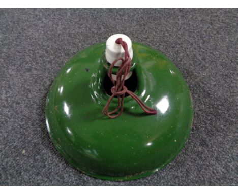 A vintage green Coolicon industrial light shade 