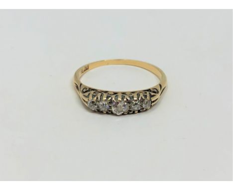 An 18ct gold five stone diamond ring, size N1/2 CONDITION REPORT: 2.6g