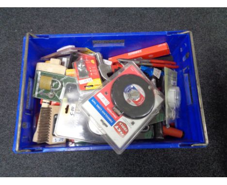 A crate of new tools, hack saws, LED shower light kit, padlocks, three piece line and pin set etc 