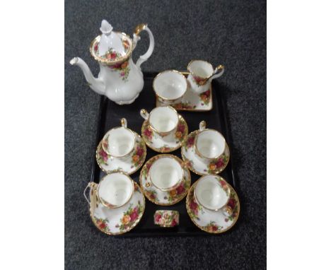 A tray of sixteen piece Royal Albert Old Country Roses tea service together with matching miniature mantel clock (17)