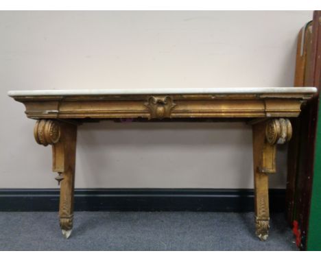 A gilt and gesso white marble topped shelf 