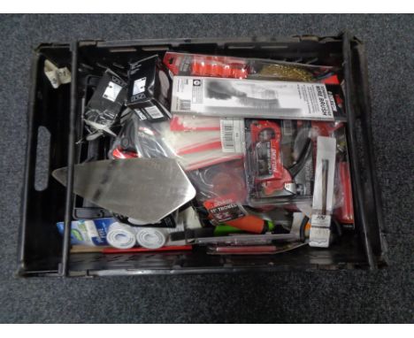 A crate of new tools, compact staple gun, wire brush, cable ties, door hinges etc 