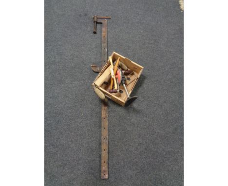 A metal sash clamp together with a box of vintage hand drill and other hand tools 