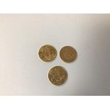A group of three gold sovereigns, 1896, 1904 and 1911