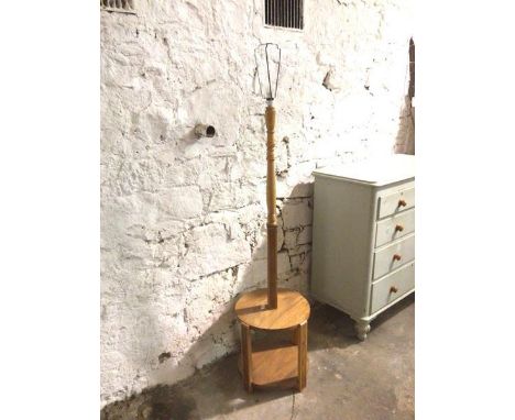 A mid 20thc floor lamp with square stem on two tier teak circular base (153cm to top of lampholder)