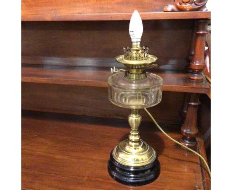 A converted oil lamp, wired for electricity, lamp stamped Young's screw fitting (40cm to top of lampholder)