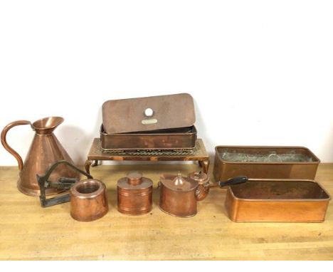 A collection of copper ware including a trivet (12cm x 40cm x 15cm), a surgical instrument sterilizer, bearing plaque Down Br