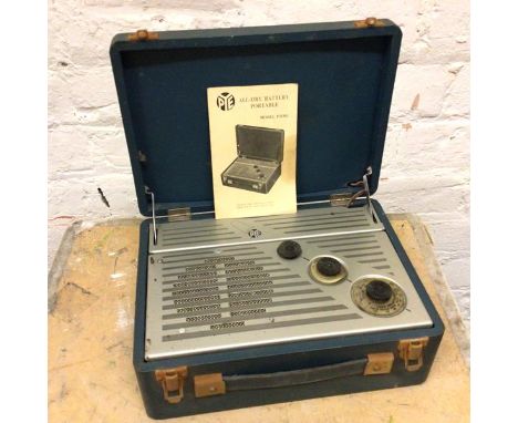 A vintage Pey All Dry battery portable model P31BQ portable radio in travelling case, with instructions (11cm x 29cm x 21cm)