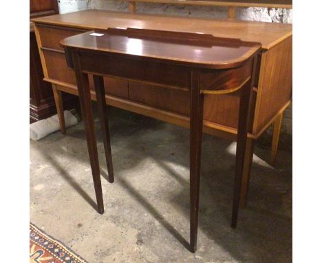 A reproduction mahogany and satinwood console table, with ledgeback, D end top, on straight tapering supports (72cm x 65cm x 