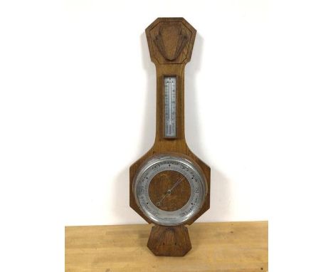 A 1930s Art Deco style oak barometer, marked Walker &amp; Hall (77cm)