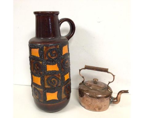 A 1960s/70s German ceramic jug, with handle to side and stamped W. Germany 409-52 to base (52cm) and a copper kettle (2)